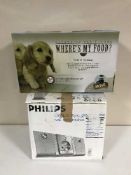 A boxed Philips stereo system and an automatic pet feeder