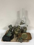 A tray of brass light fitting, brass oil lamp, assorted cameras, vintage surgical dressing tin,
