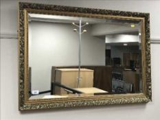 A gilt framed mirror