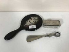 A silver lidded cut glass pot,