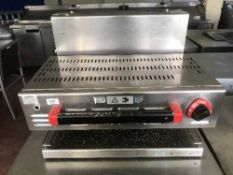 A stainless steel electric grill