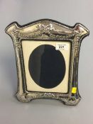 A silver easel photograph frame, London 1988, height 30.