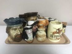 A tray of toby jugs and tankards inc.
