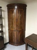 A late 19th century mahogany double corner cabinet