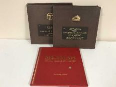 A box of folders containing 78's