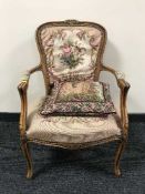 A continental walnut framed armchair