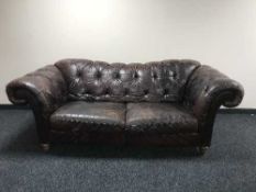 A Barker & Stonehouse brown button leather Chesterfield settee