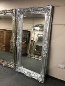 A large silvered bevelled mirror