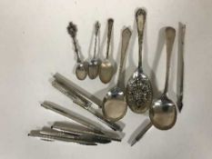 A small collection of silver writing utencils, plated cutlery,