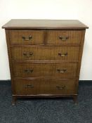 An early 20th century mahogany five drawer chest