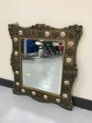 An ornate French style gilt framed mirror