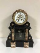 A Victorian two tone French marble mantle clock with open escapement and mercury pendulum