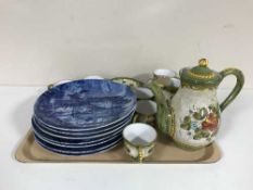 A tray containing a thirteen-piece pottery tea service together with a set of seven West German