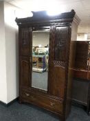 A Victorian mahogany mirror door wardrobe