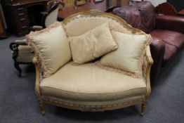 A continental two seater settee with scatter cushions CONDITION REPORT: The legs do