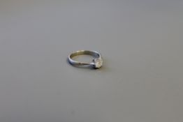 A platinum diamond solitaire ring CONDITION REPORT: Approximately 0.5 carat.