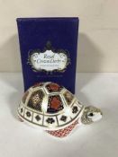 A Royal Crown Derby Turtle paperweight with gold stopper,