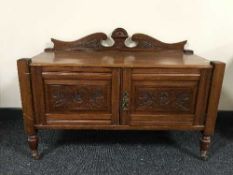An Edwardian mahogany wash stand,