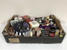 Two boxes of assorted candles,