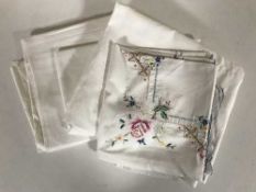 A box and suitcase of assorted table linen