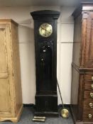 An early 20th century oak longcase clock