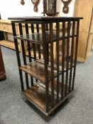 An Edwardian oak revolving bookcase