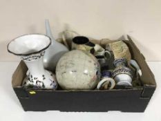 Two boxes of assorted pottery jugs, globe, enamelled urn, chess board,