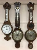 A Victorian inlaid mahogany barometer