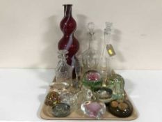 A tray of glass decanters, liqueur glasses, red bulbous glass vase,