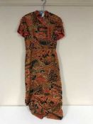 A Japanese Kimono embroidered with gold thread by Salvador,