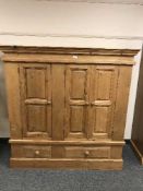 A pine child's combination wardrobe