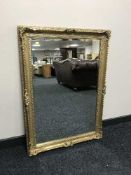 A decorative gilt framed mirror