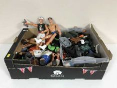 A box of vintage Action Men