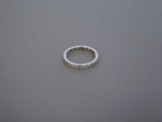 A platinum diamond eternity ring