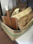A box of chopping boards and display boards
