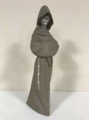 A Lladro figure of a monk