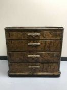 A continental walnut four drawer chest