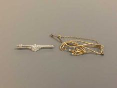 Two 18ct gold diamond set brooches, 7.