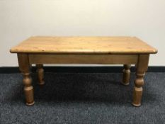 A rectangular pine coffee table