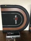 A Red Tooth poker table and chips