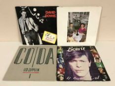 Seven boxes of LP records - David Bowie, Led Zeppelin, Kiss,