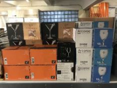 A large quantity of commercial glass ware, wine glasses,