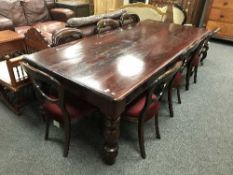 A Victorian style mahogany dining table and seven chairs
