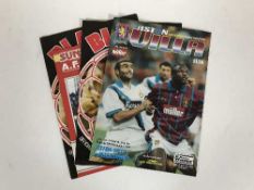 A box of late 20th century football programmes inc.