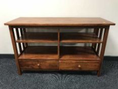 A set of contemporary bookshelves fitted two drawers