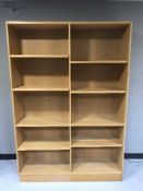 A set of oak effect open shelves