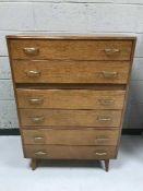 A mid 20th century six drawer chest