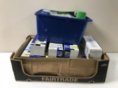 Four boxes containing a quantity of assorted halogen bulbs and lights