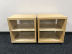 A pair of contemporary beech trolleys