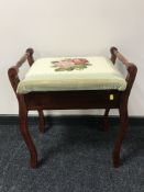 A storage piano stool